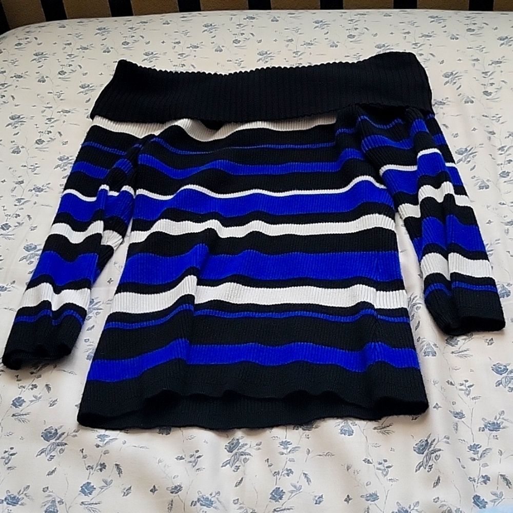 Black, blue, and white off the shoulder sweater